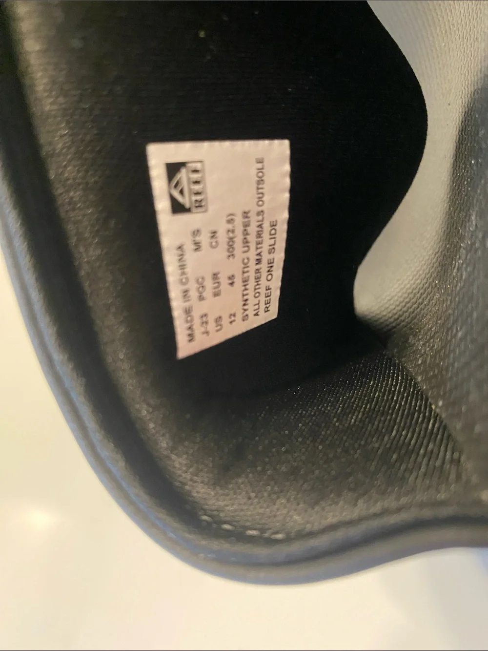 Reef Men’s Black Slide Sandals with White Logo